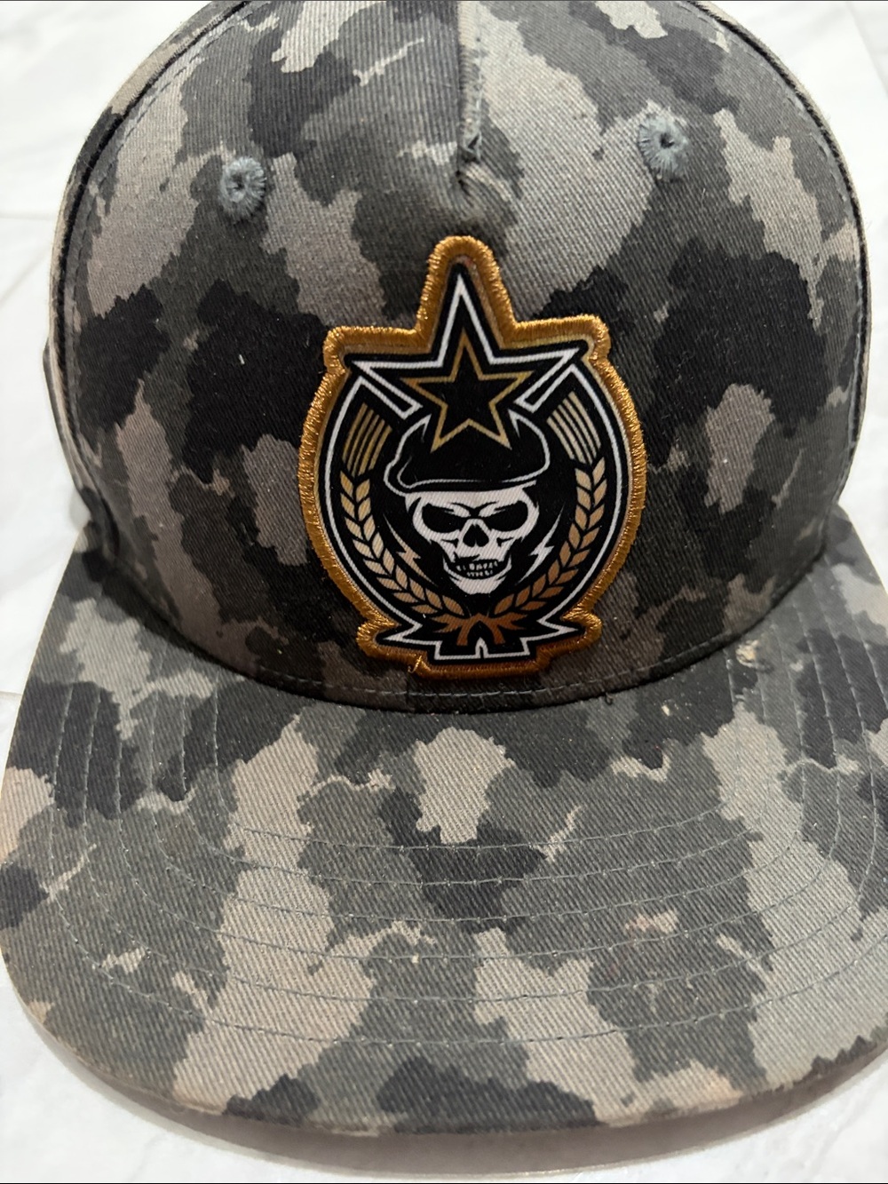 Gray Camo Snapback Hat with Skull Emblem